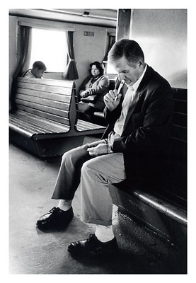 Men writing on a note book